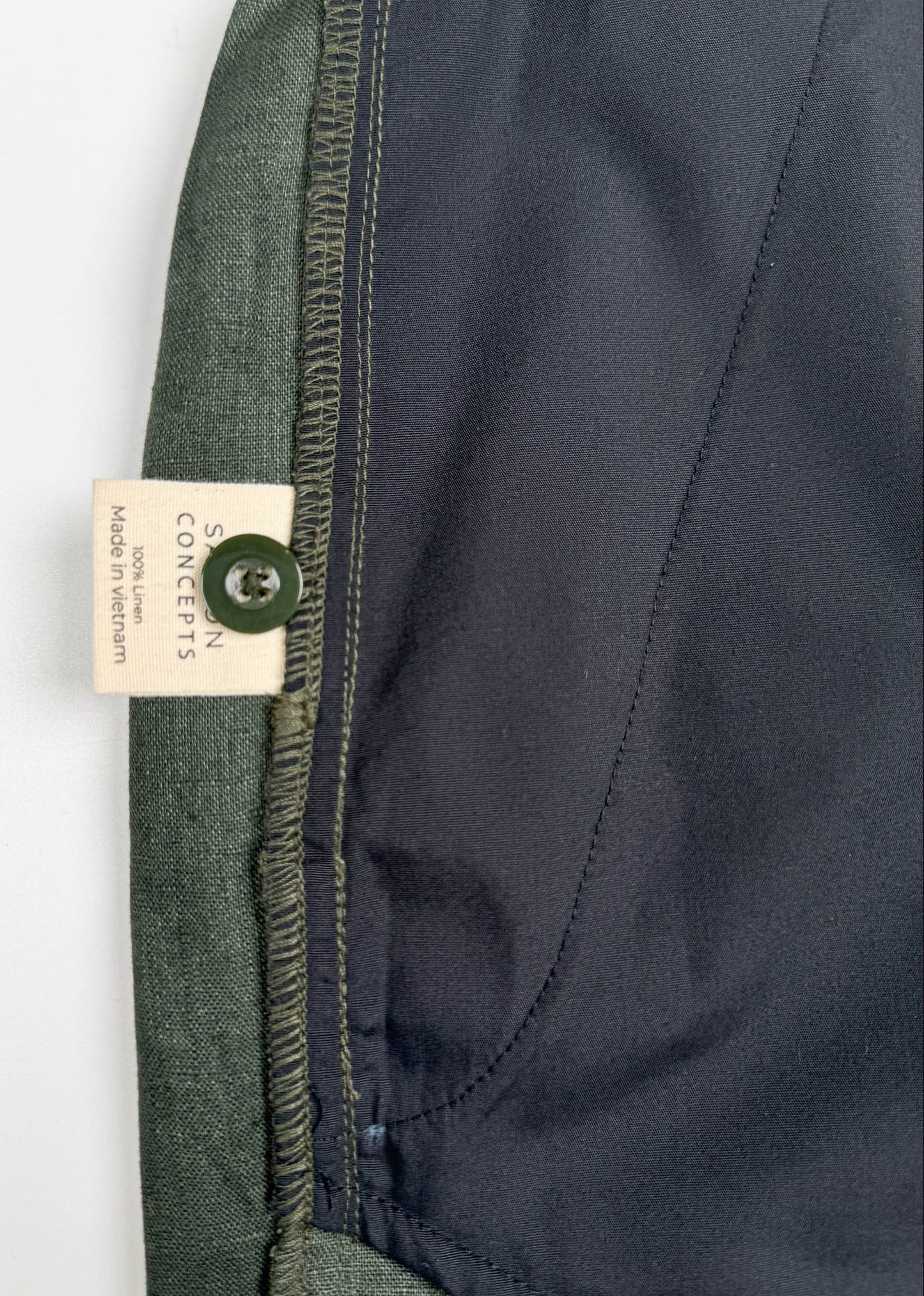Deep Army Green Linen Shorts - inside care label and spare button detail - Saigon Concepts