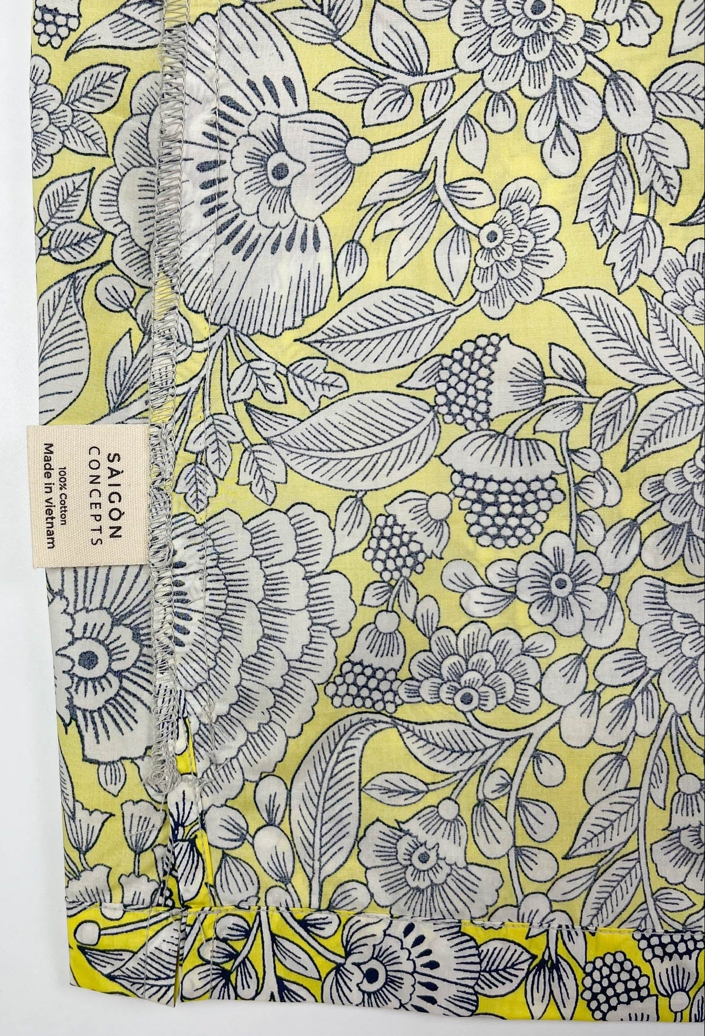 Sunshine Chintz short sleeve pyjama top lay flat inside care label detail. Saigon Concepts