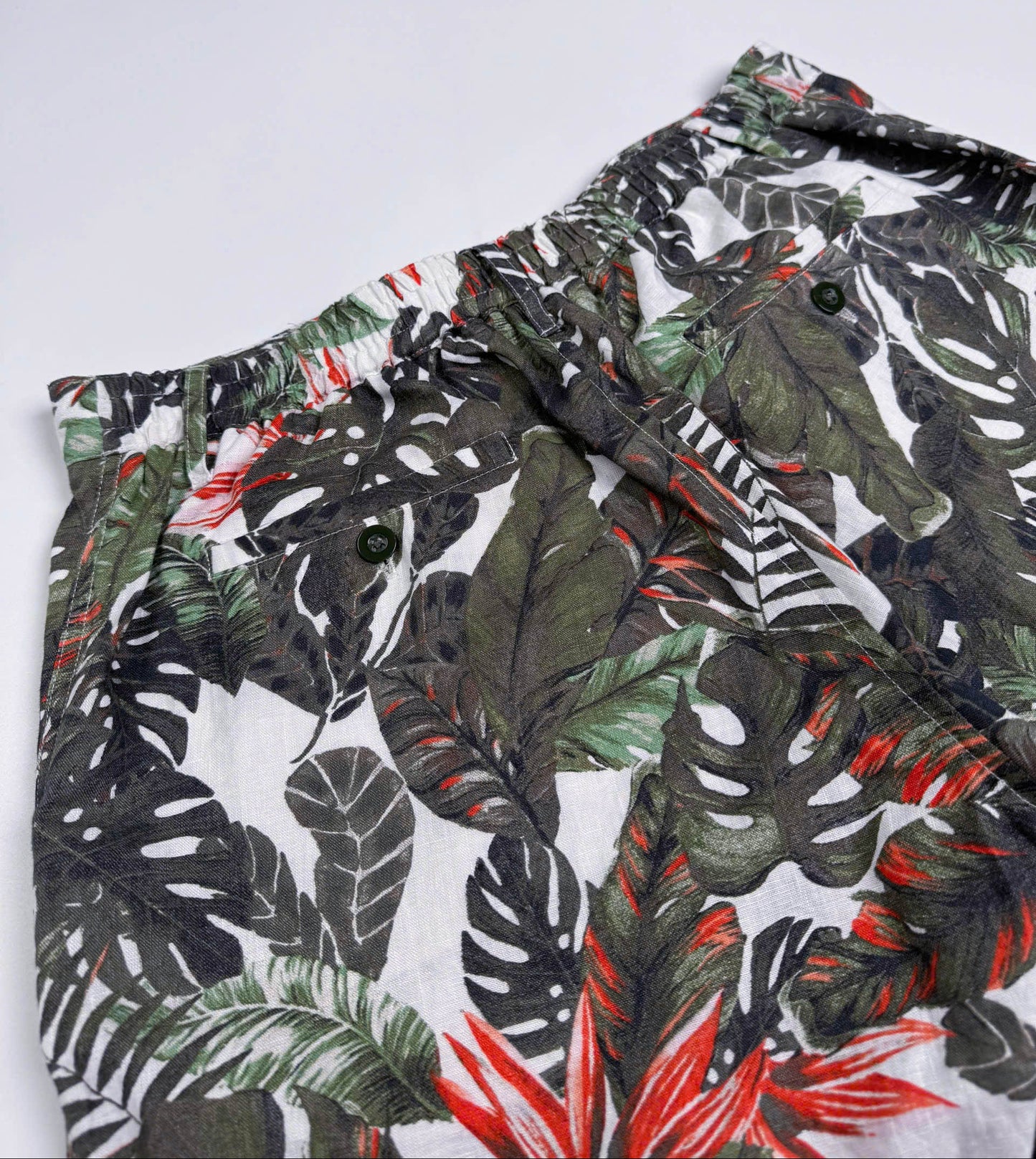 Saigon Concepts Fire & Fern Tropical Print Linen Shorts - back waistband & pocket detail