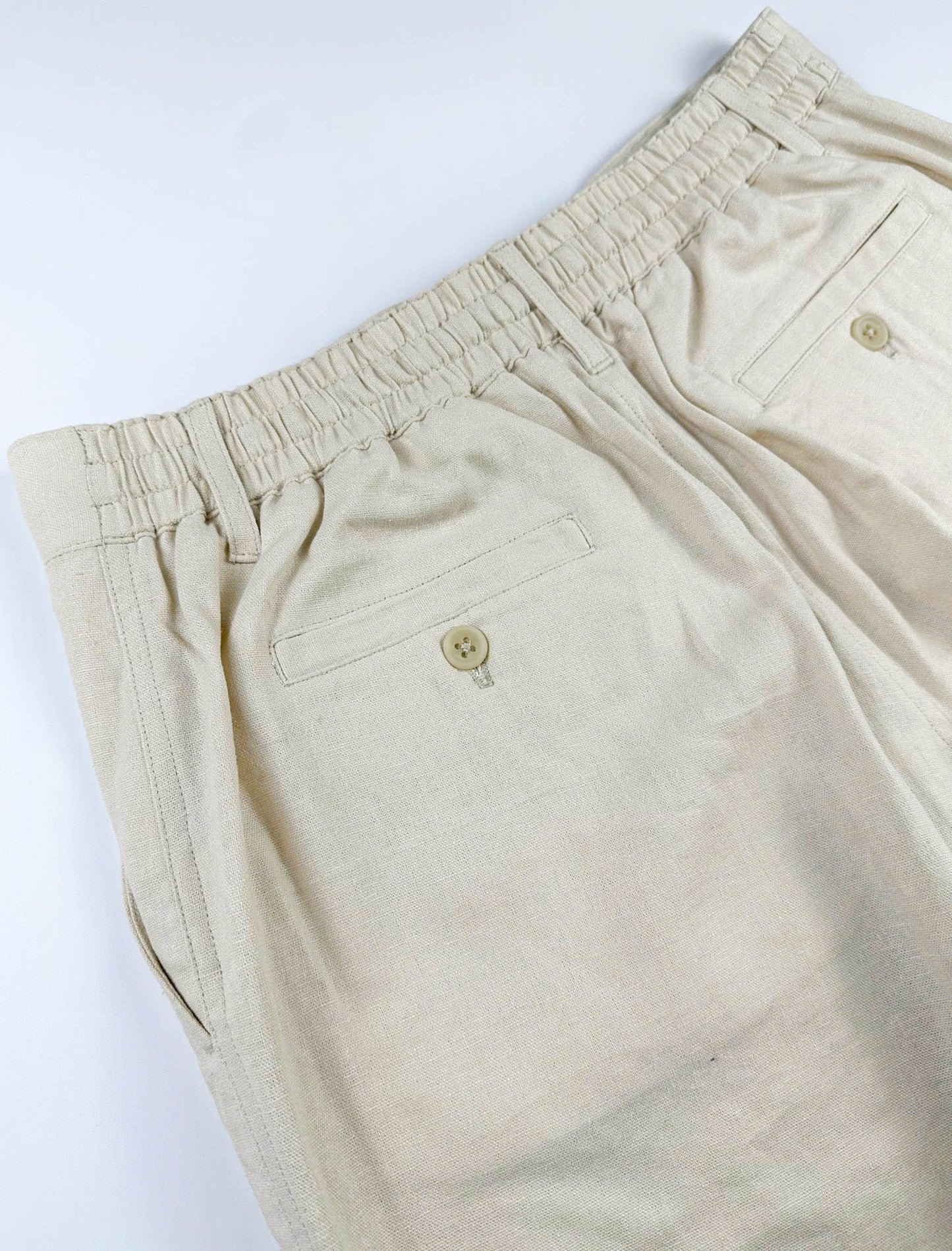 Sand coloured shorts featuring elastic waistband detail