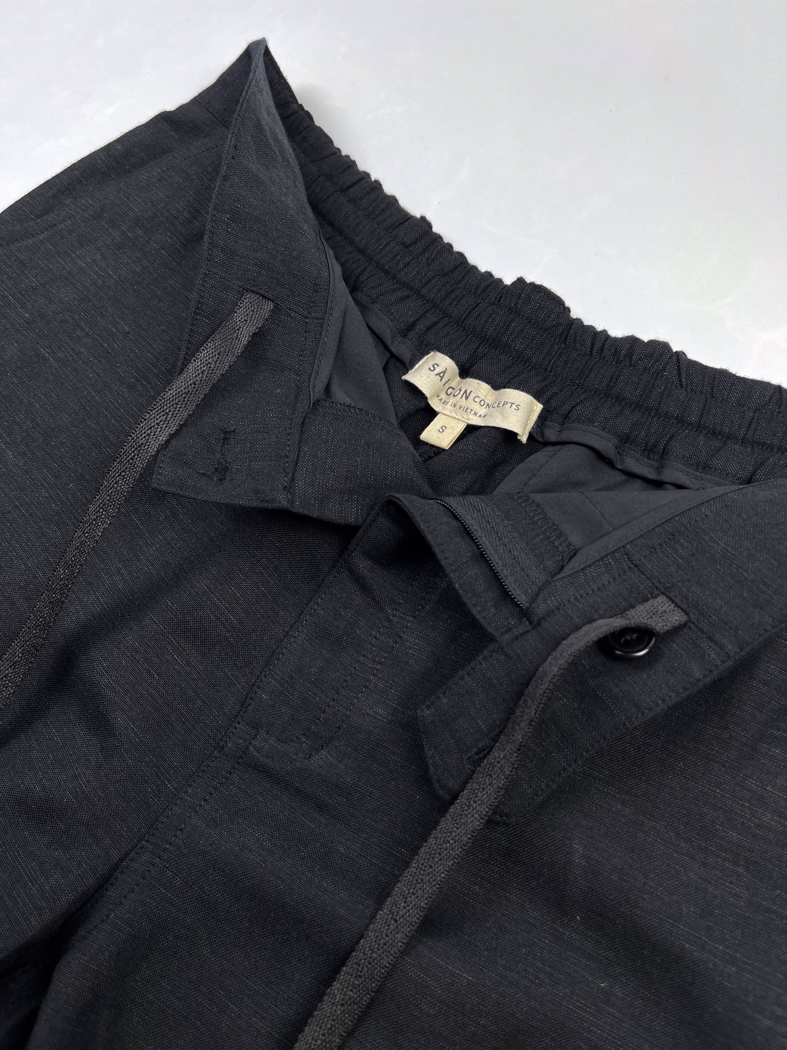 Front view of inside draw string detail on black Linen Cotton Riviera Shorts - Saigon Concepts