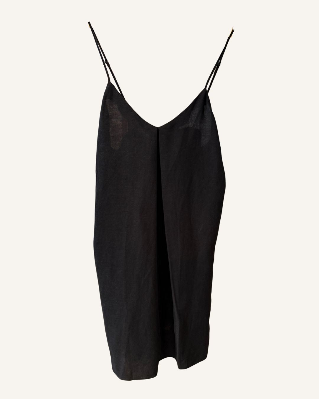 Black linen cami slip dress on a white background