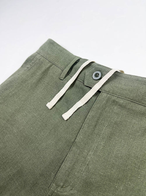 Front detail of Army Green linen Riviera Shorts, button closure and drawstring – Saigon Concepts