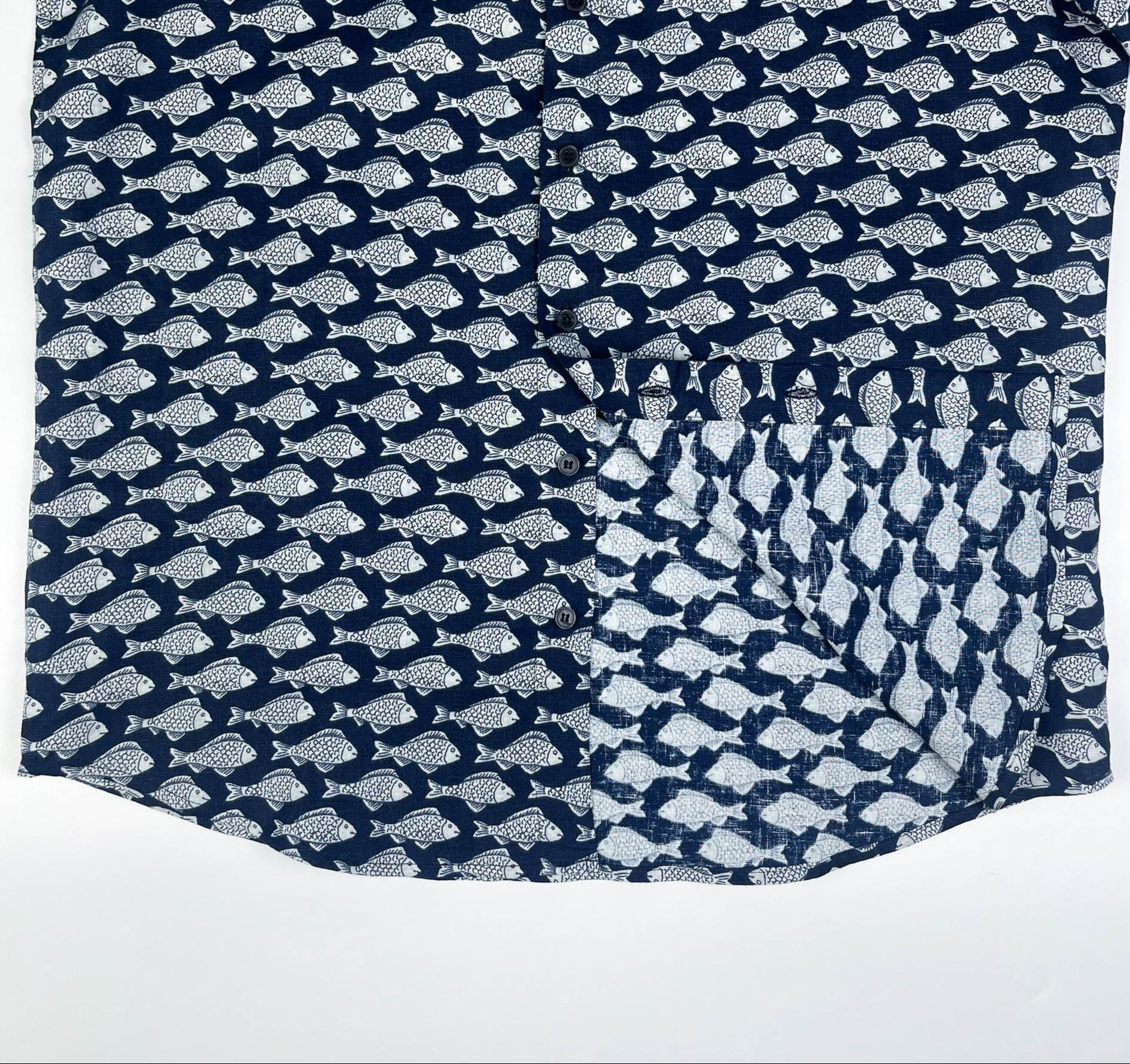 Darkwave Shoal linen short sleeve button-up shirt lay flat inside seam view, white fish shoal print on navy