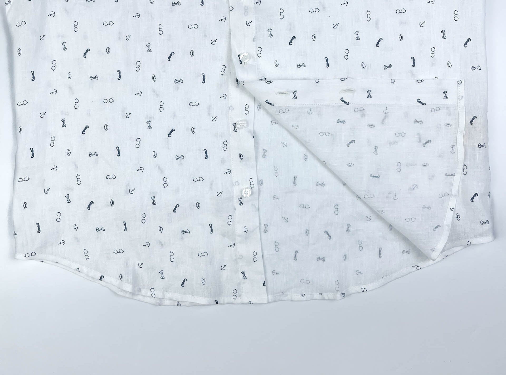 Gentlemen Club linen button-up shirt lay flat inside seam view, minimalist print