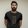 Man wearing a black t-shirt with rainbow coloured text against a plain background