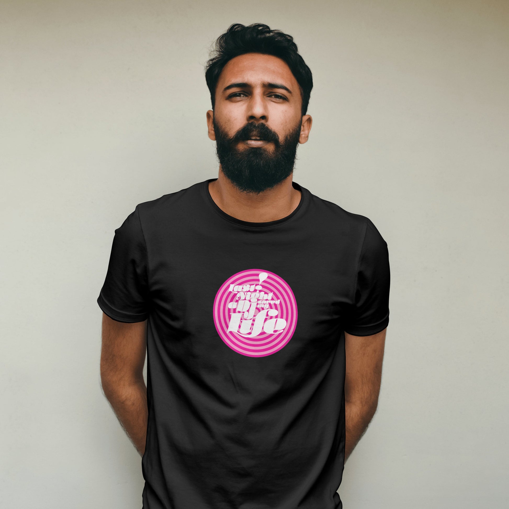 Man wearing a Black t-shirt with DJ Saved My Life Print against a plain background