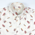 Crayon Strokes on natural white linen fabric, short sleeve button-up shirt lay flat neck detail view