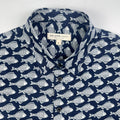 Darkwave Shoal linen short sleeve button-up shirt lay flat front, white fish shoal print on navy