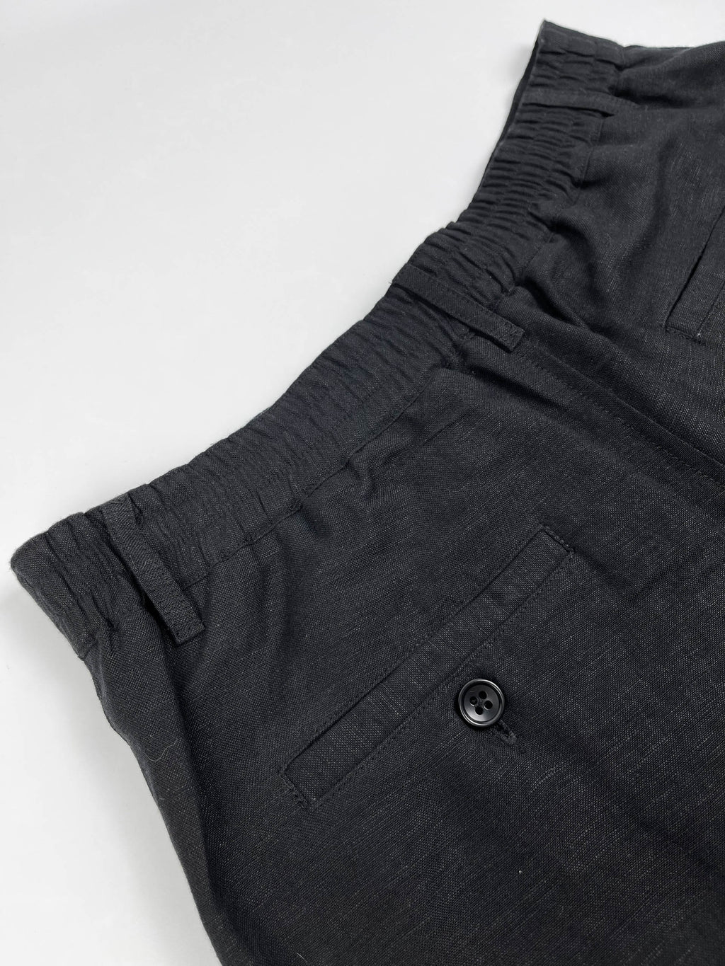 Men's black linen cotton pants by Saigon Concepts - elastic back waistband view