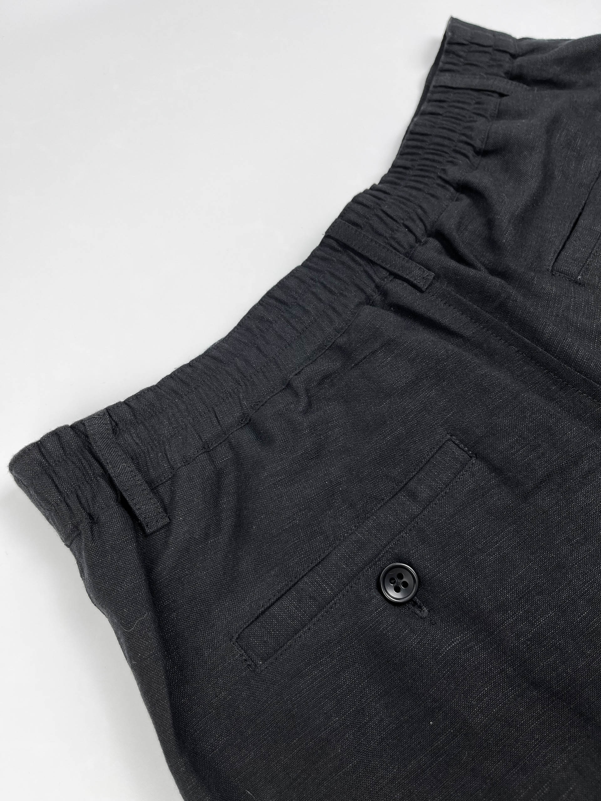 Men's black linen cotton pants by Saigon Concepts - elastic back waistband view