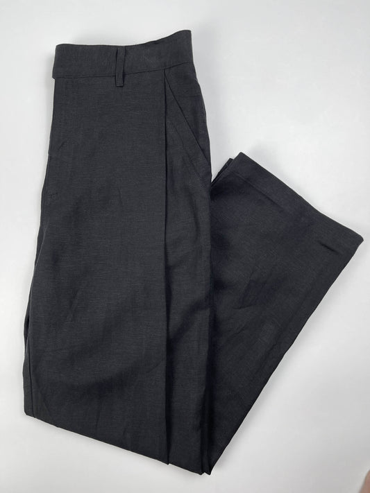 Men's black linen cotton pants with pleated front and elastic waistband by Saigon Concepts - lay flat view