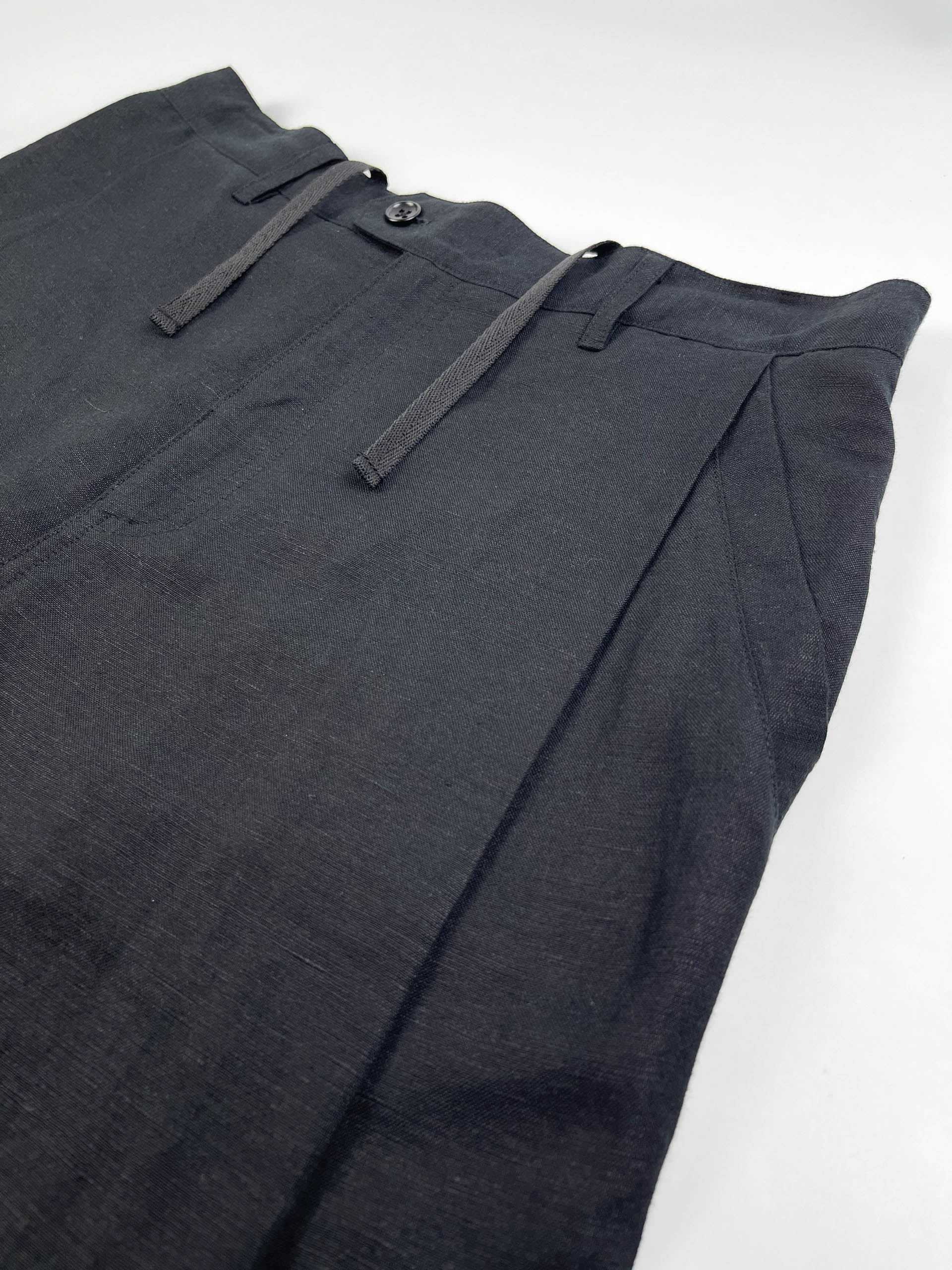 Men's black linen cotton pants with pleated front and elastic back waistband by Saigon Concepts - front waistband view