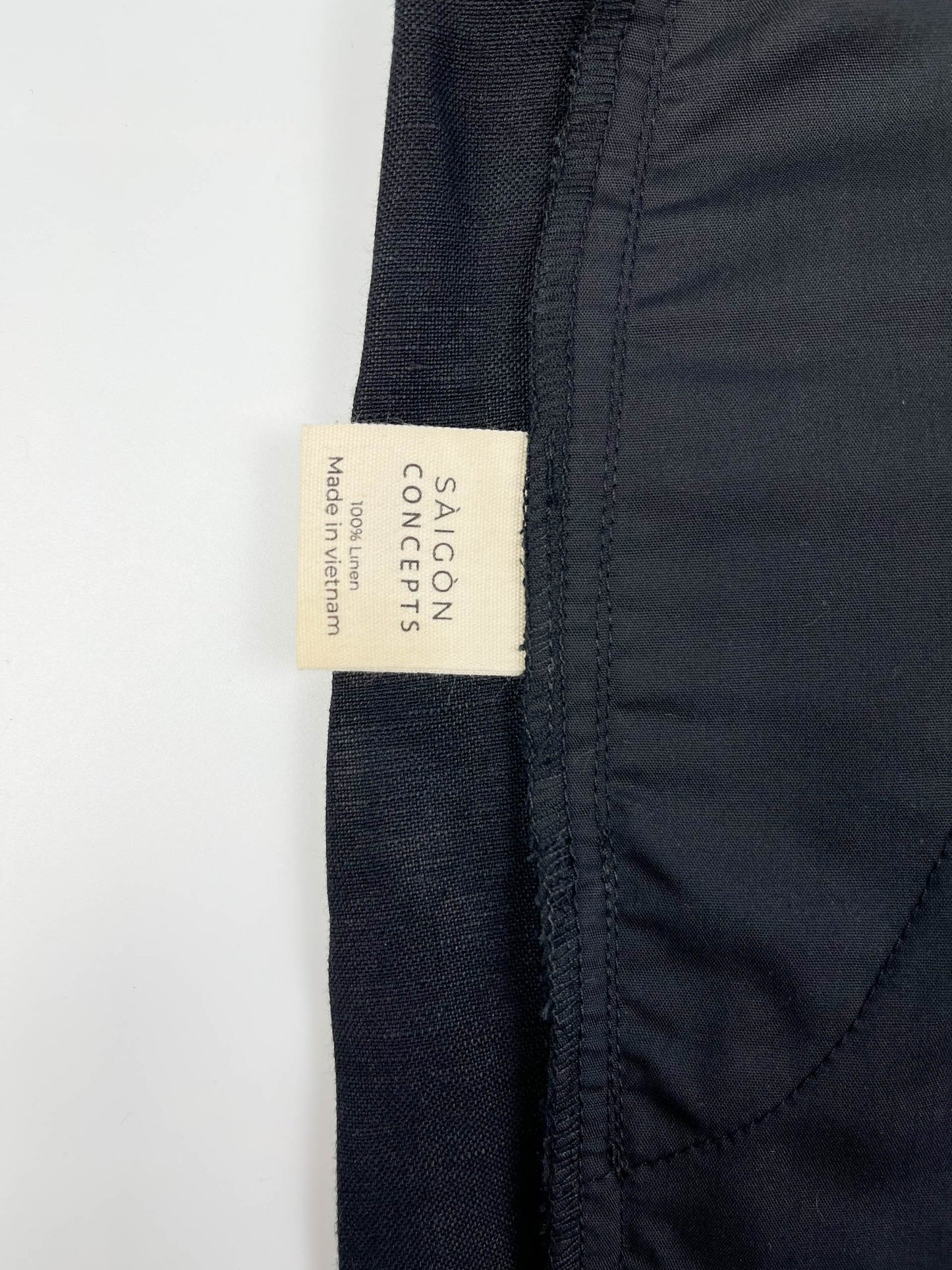 Men's black linen cotton pants by Saigon Concepts - inside care label detail