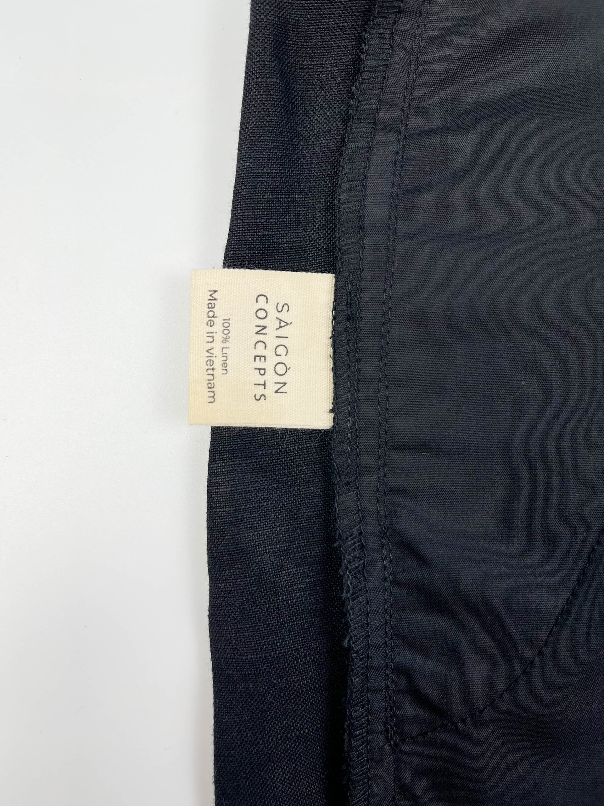 Men's black linen cotton pants by Saigon Concepts - inside care label detail