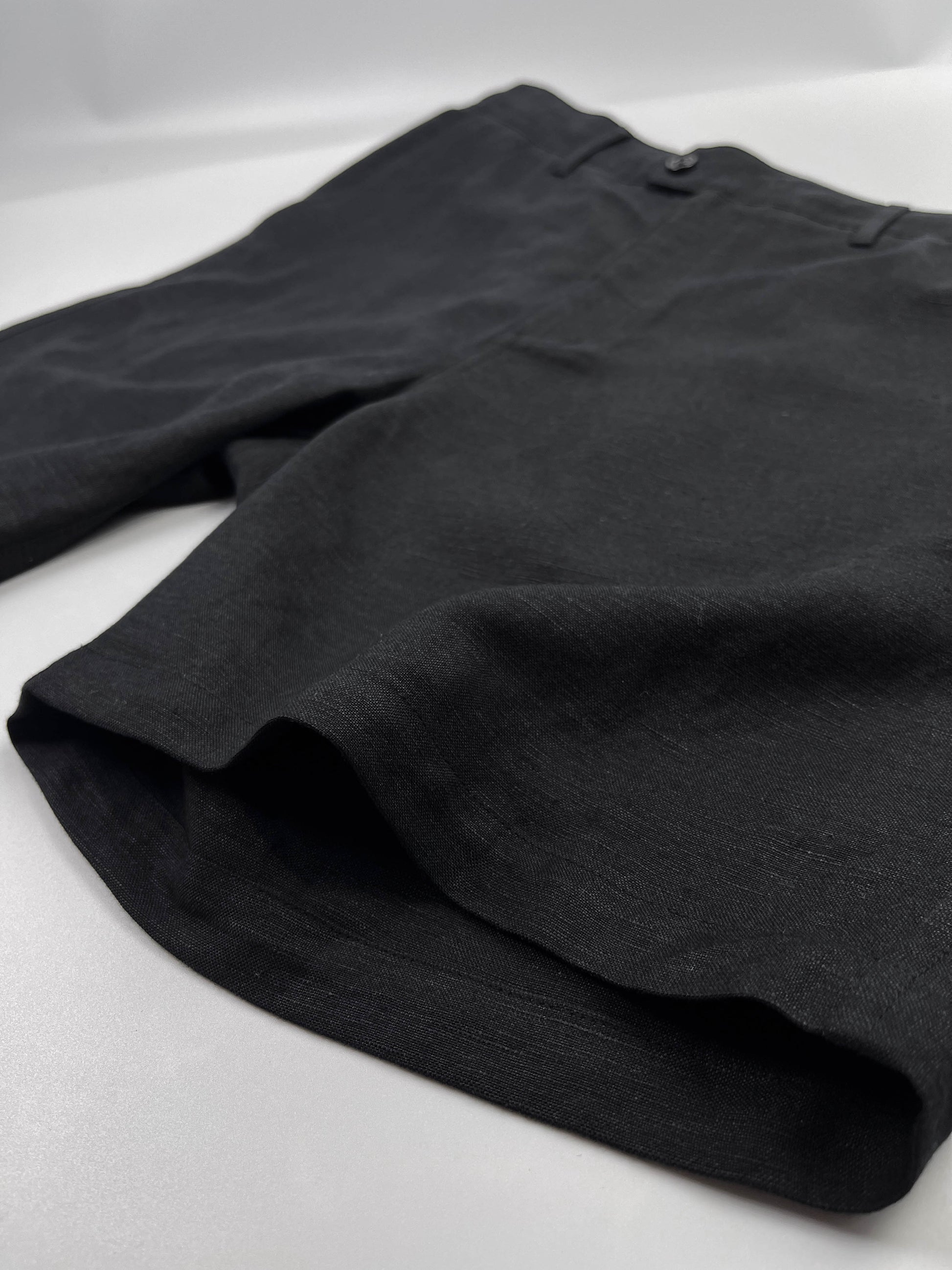 Saigon Concepts Black Linen Riviera Shorts - front edge seam detail view