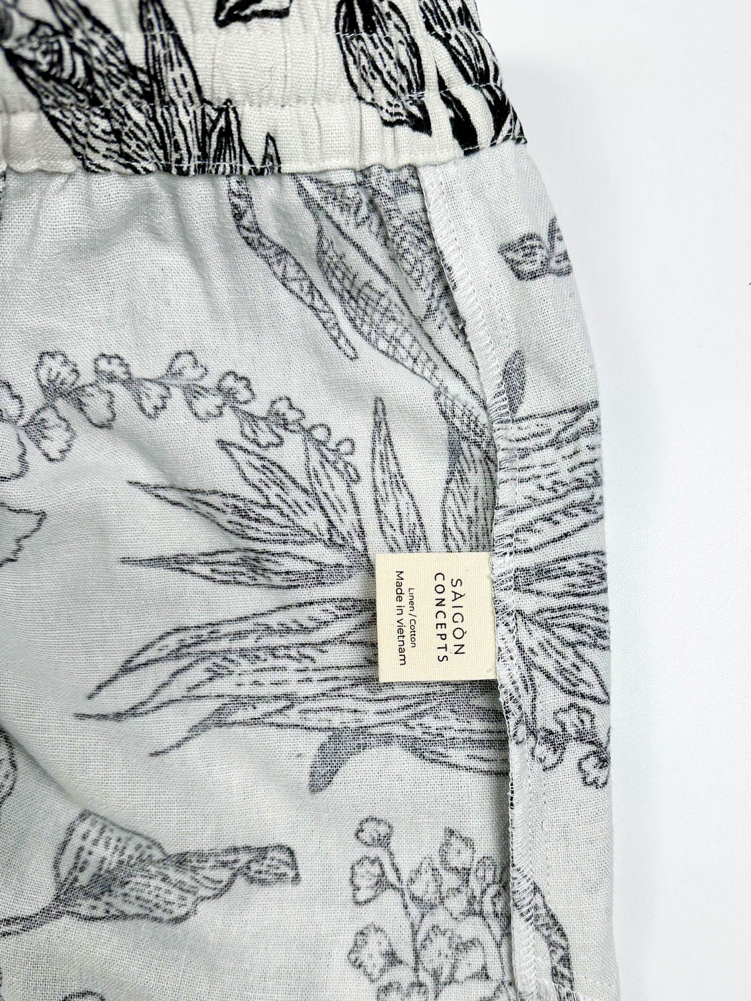 Saigon Concepts women's botanical print pyjama pants with elastic waist and side pockets - care label detail