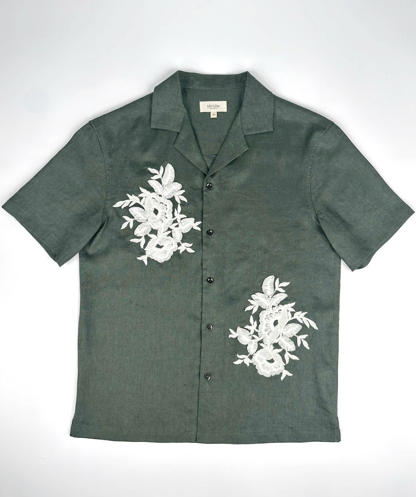 Saigon Concepts Deep Army Green Hawaiian Linen shirt with white floral lace on a light grey background - full front view
