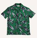 Saigon Concepts Green linen shirt with black leaf pattern on a white background - full front view