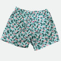 Pink Flamingo and green tropical leaf patterned lounges shorts on a light gray background - lay flat front view