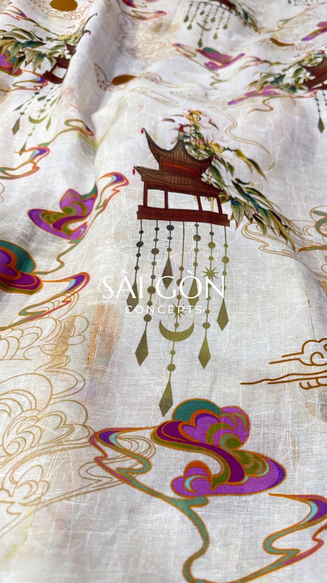 Saigon Concepts Spring Pagoda fabric with brown pagodas and pink Asia inspired swirls printed on a cream linen organza fabric - close up view.  