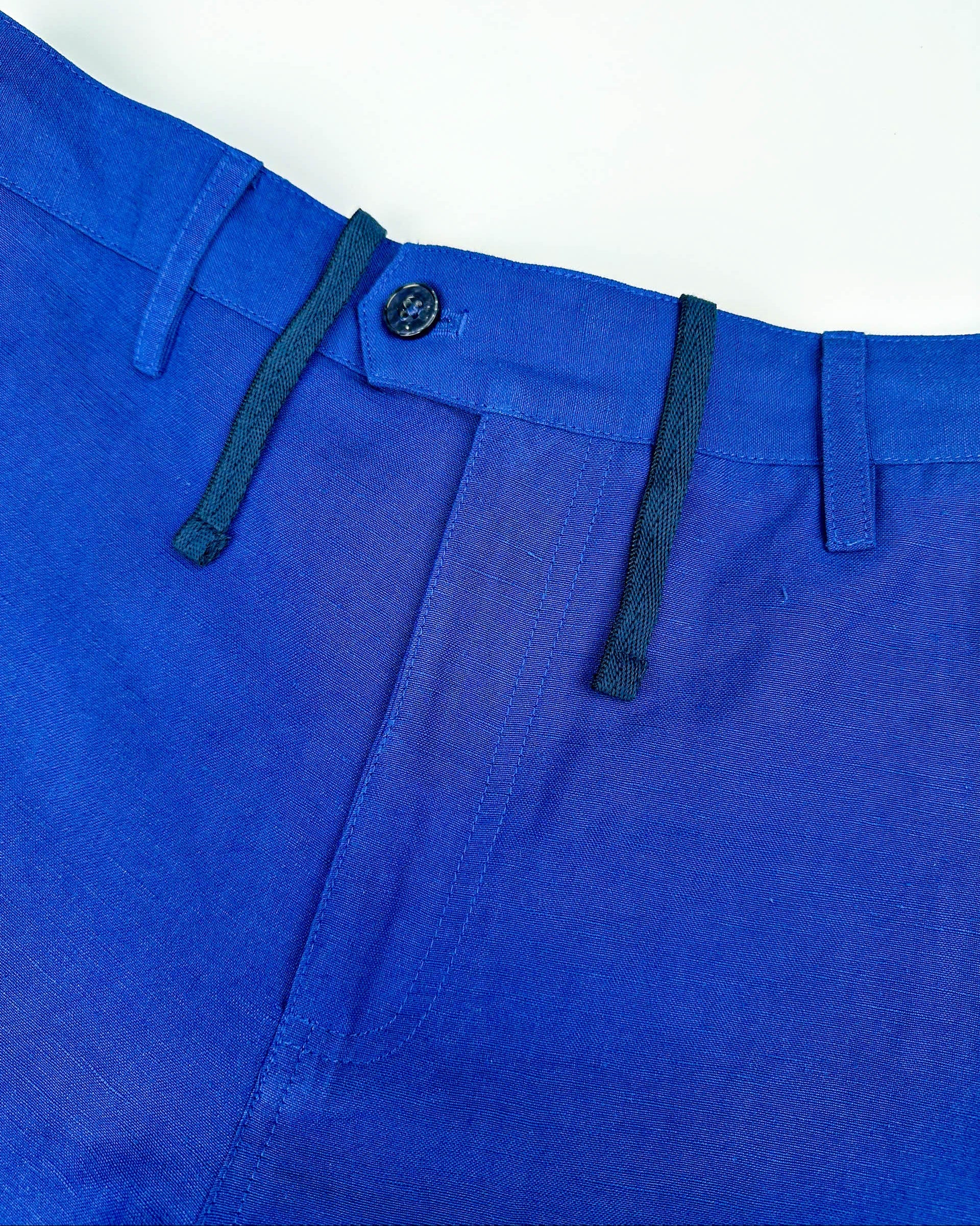 Saigon Concepts Cobalt Blue Riviera Shorts - Flat Front button closure and internal drawstring detail. 