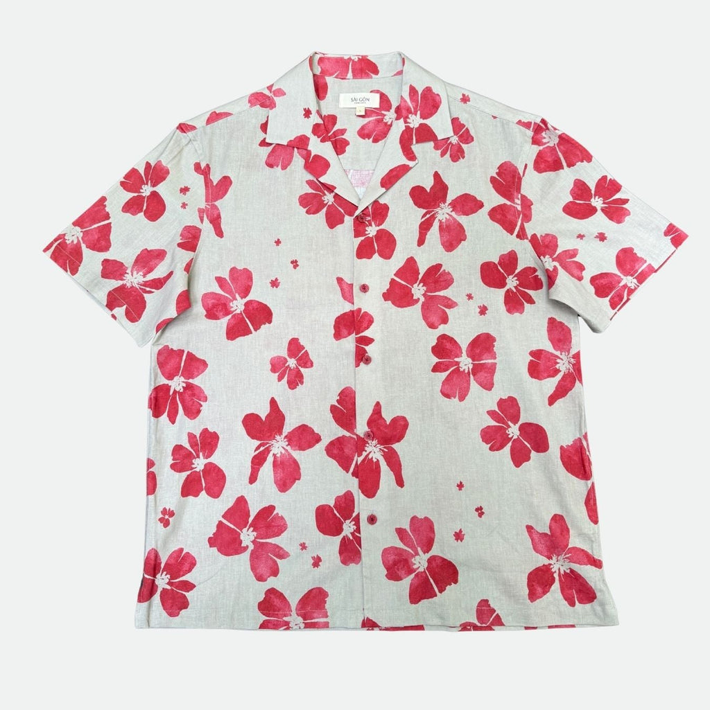 Beige- light cream colour shirt with ruby red hibiscus floral pattern on a white background - lay flat front view