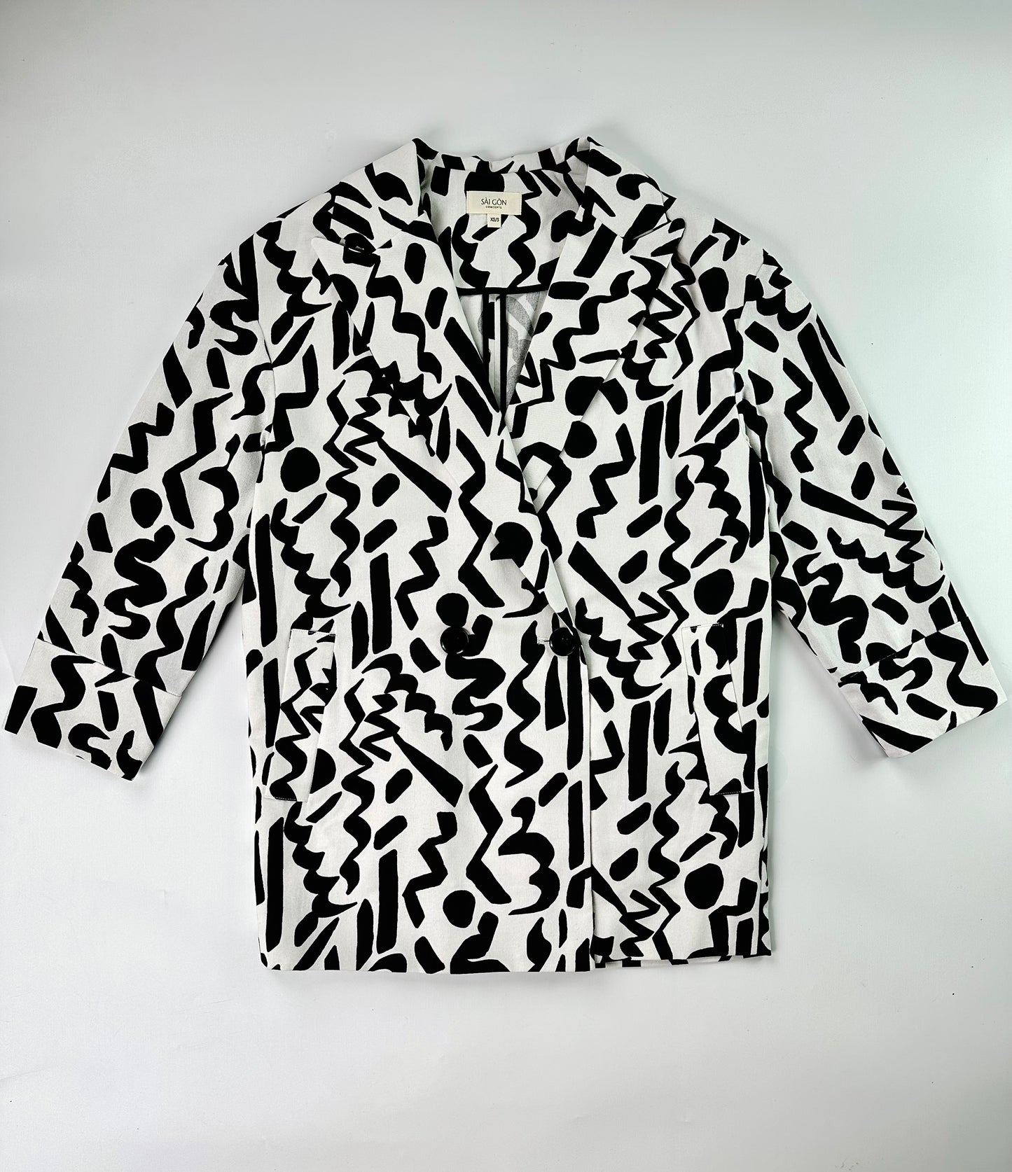 Saigon Concepts Black and white Urban Canvas patterned jacket on a light gray background - full front flat view