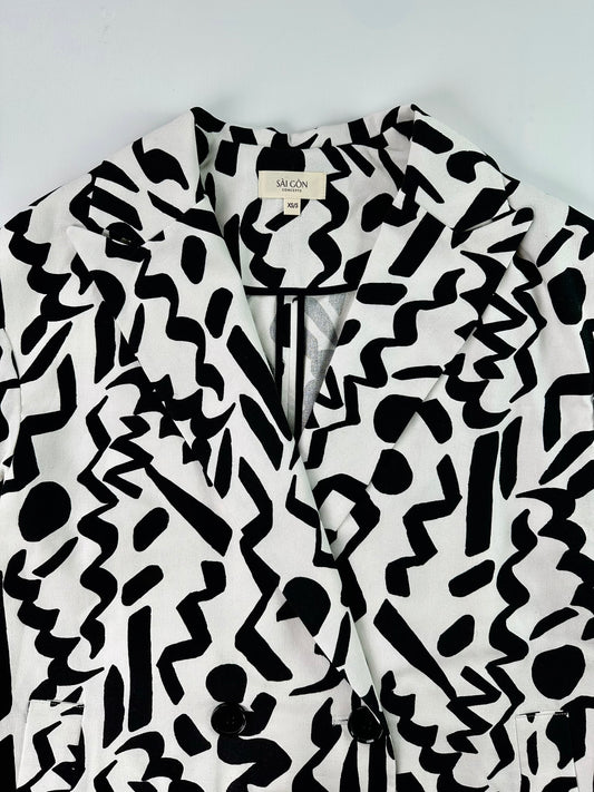 Saigon Concepts Black and white Urban Canvas patterned jacket on a light grey background - front collar detail