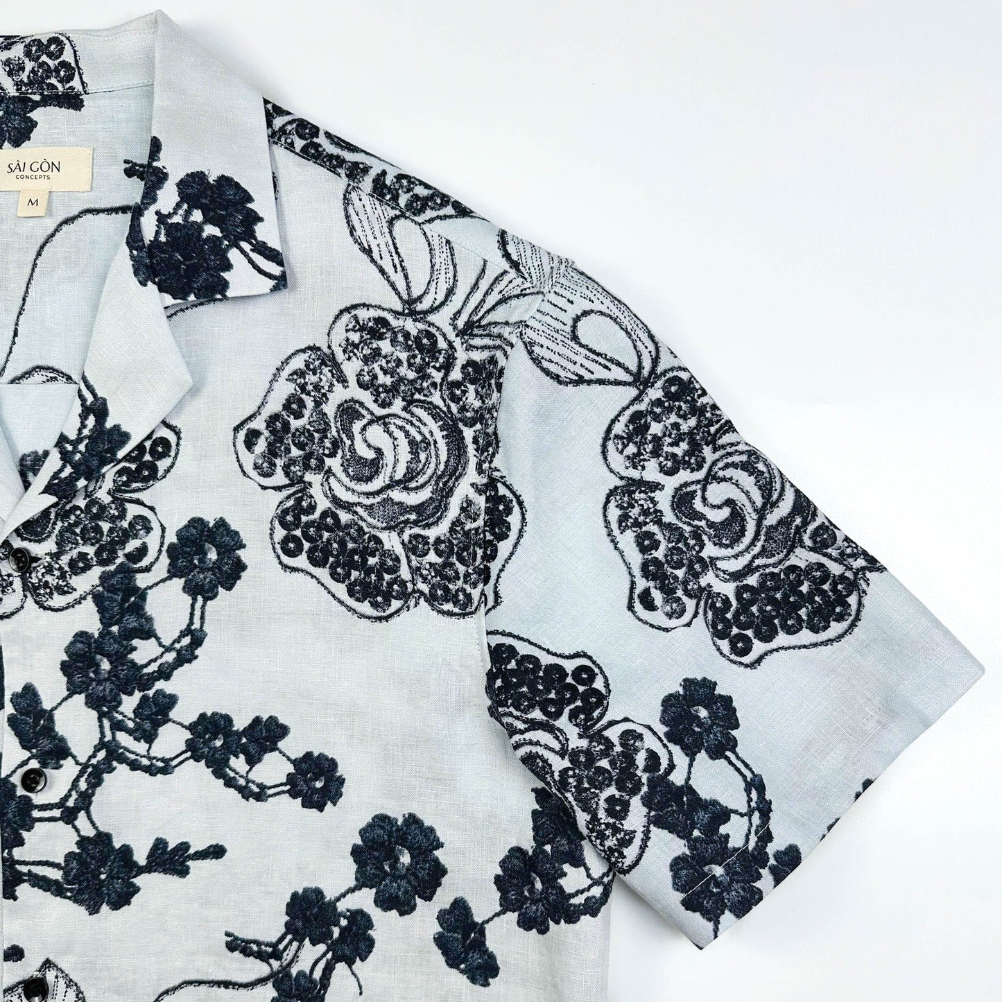 Saigon Concepts White linen Hawaiian shirt with black floral patterns - sleeve detail