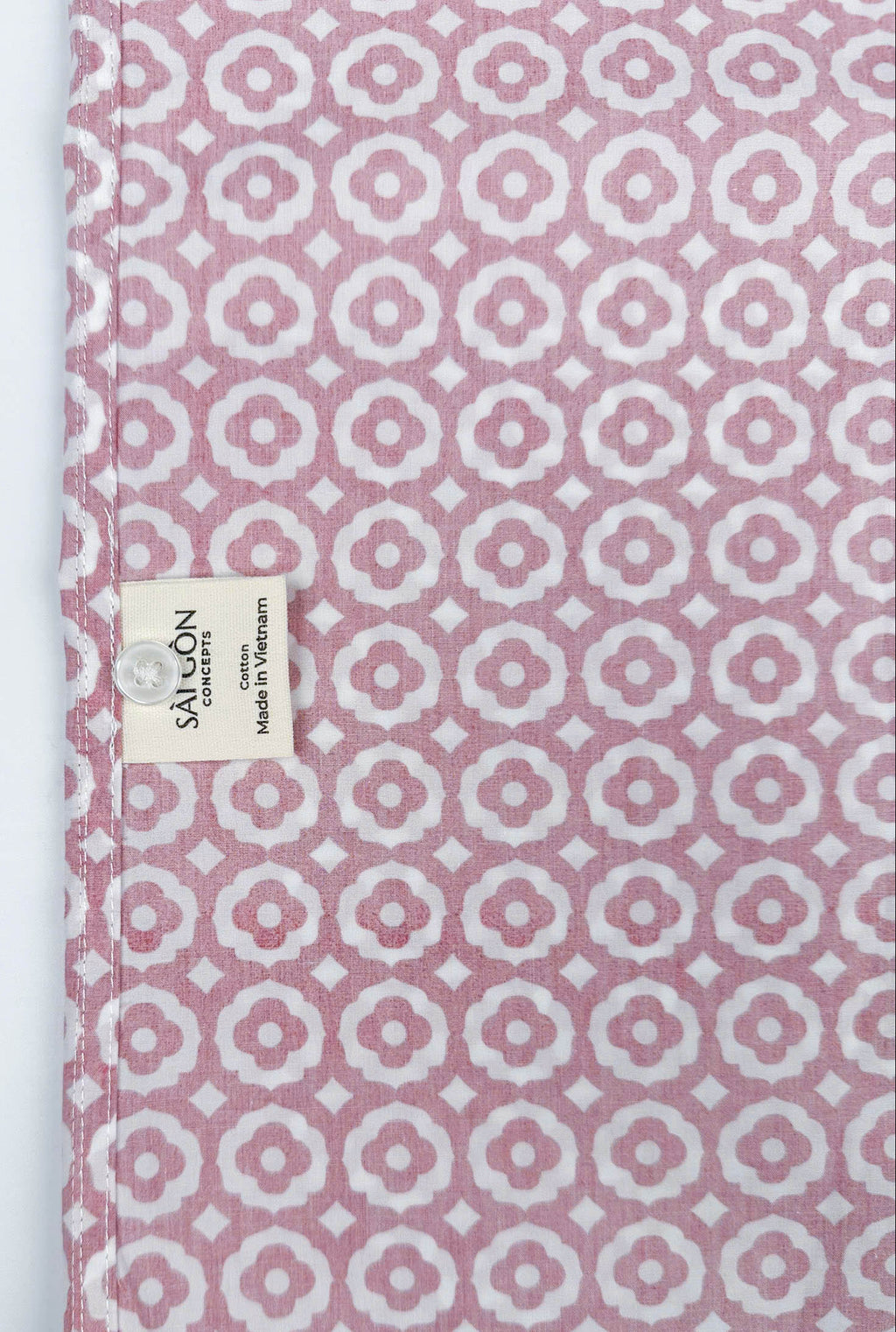 Saigon Tiles short sleeve button-up shirt lay flat inside care label view, terracotta and white geometric tile print