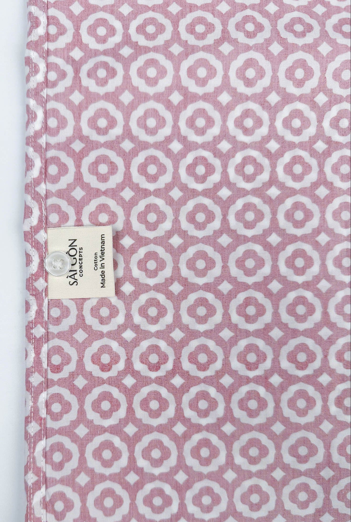 Saigon Tiles short sleeve button-up shirt lay flat inside care label view, terracotta and white geometric tile print