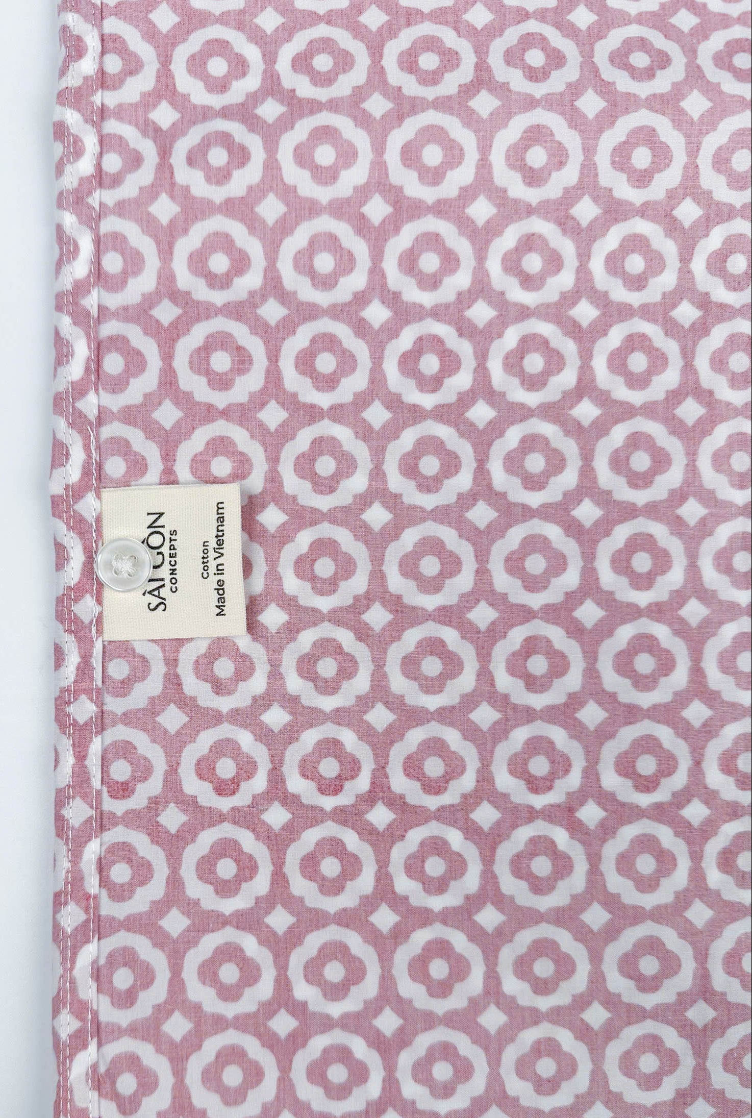 Saigon Tiles short sleeve button-up shirt lay flat inside care label view, terracotta and white geometric tile print