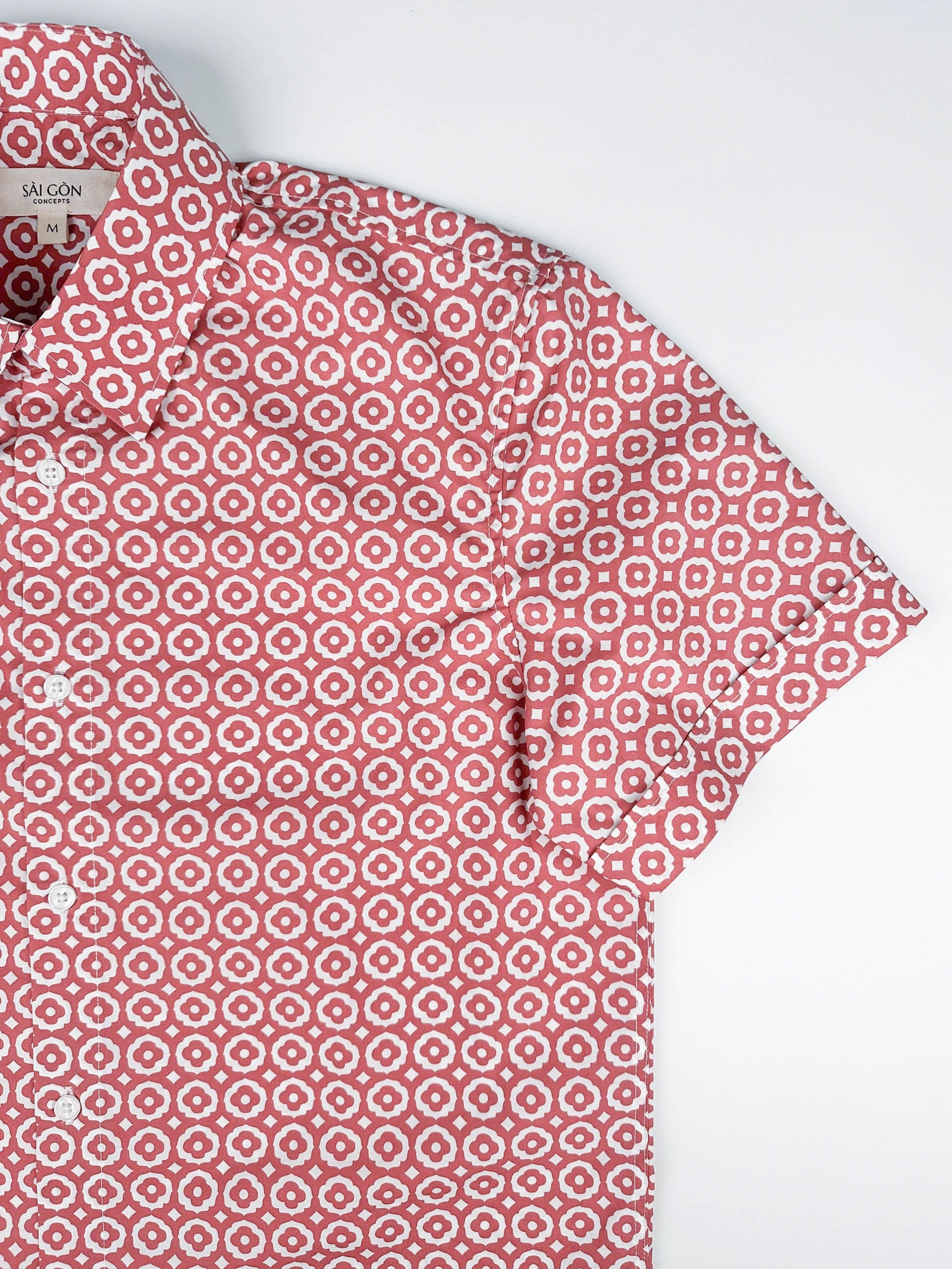 Saigon Tiles short sleeve button-up shirt lay flat sleeve detail view, terracotta and white geometric tile print