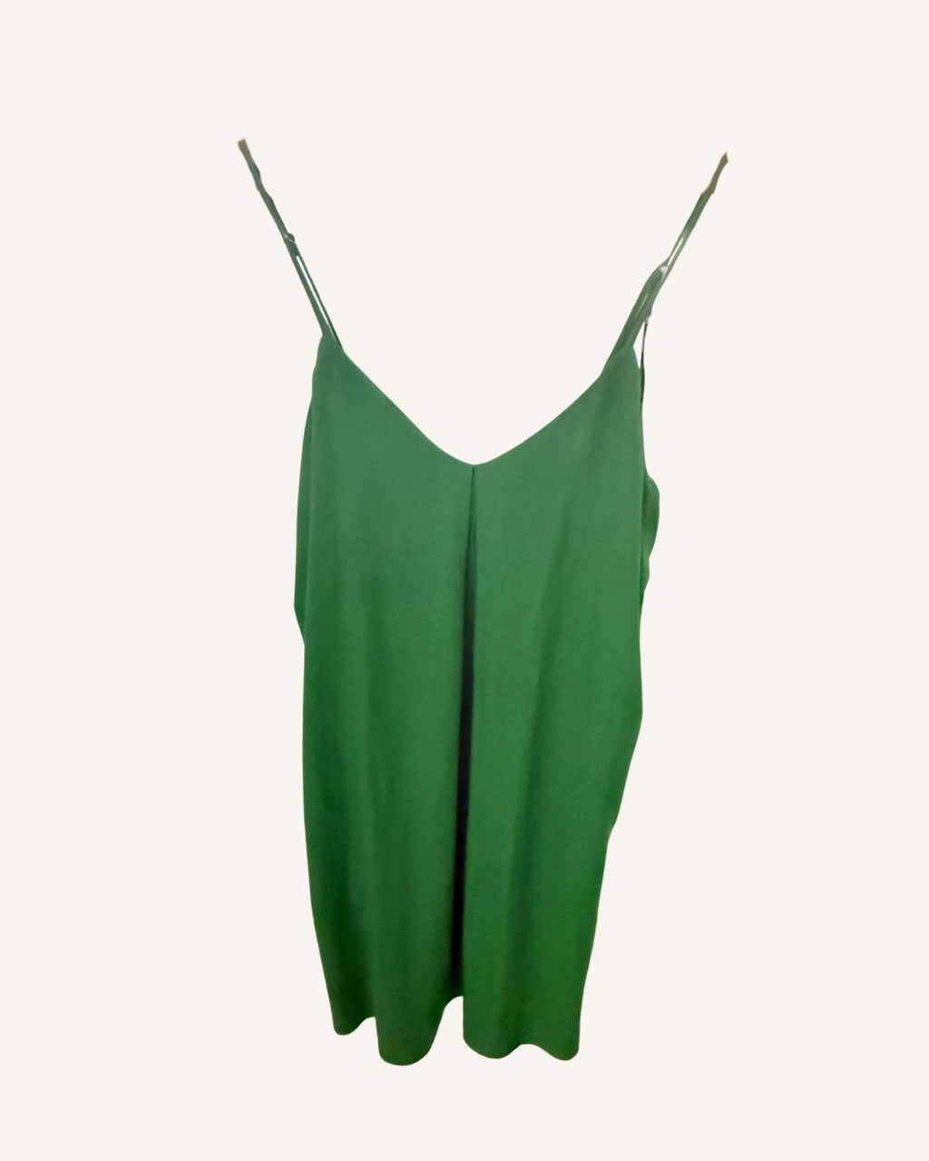 Green linen cami slip dress on a white background