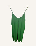 Green linen cami slip dress on a white background