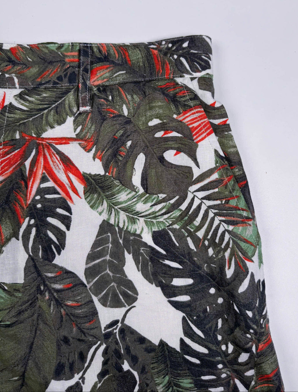 Saigon Concepts Fire & Fern Tropical Print Linen Shorts - front side pocket detail