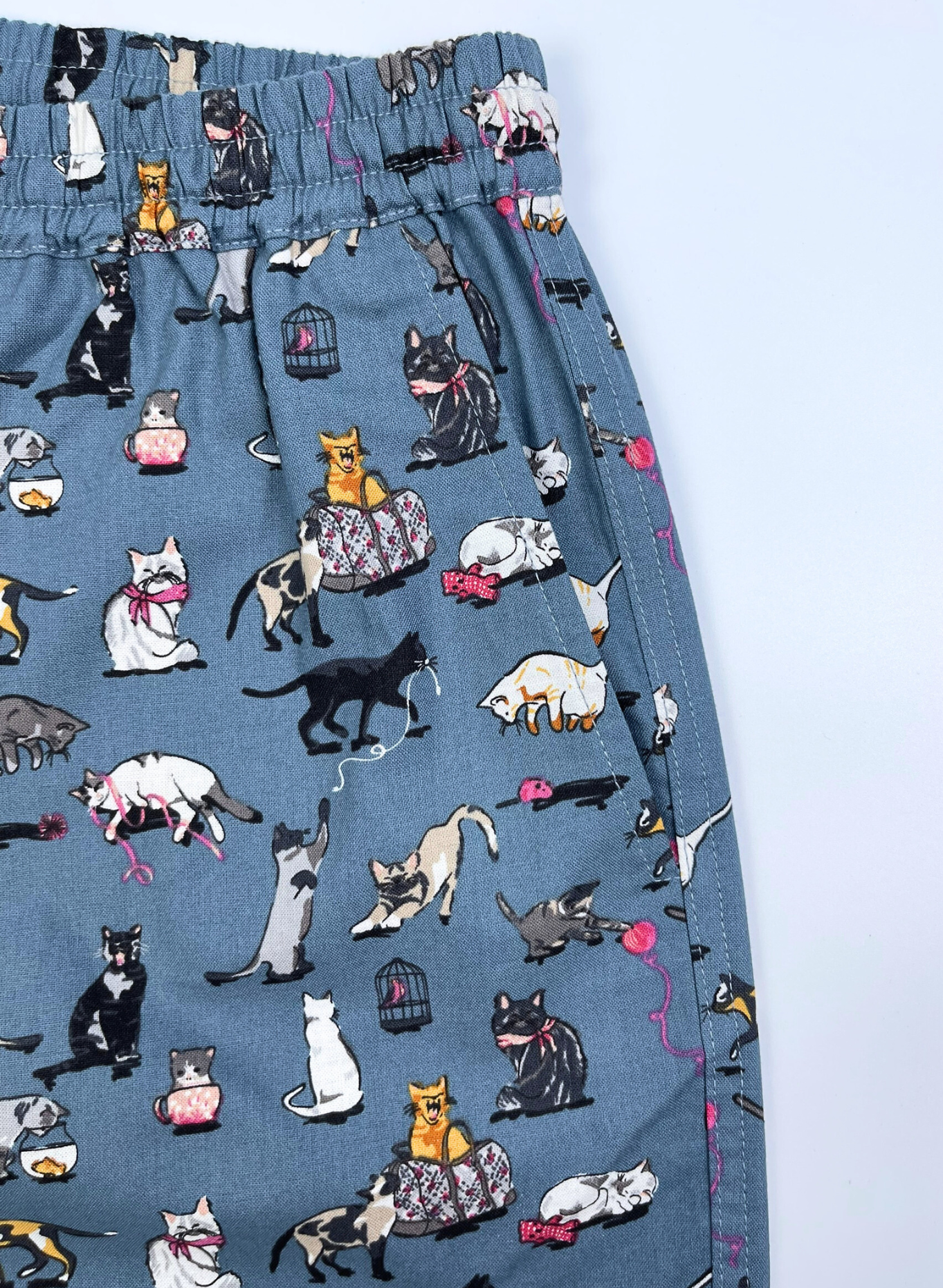 Saigon Concepts Meow Meow cat print lounge shorts in blue-grey cotton with elastic waistband - pocket detail