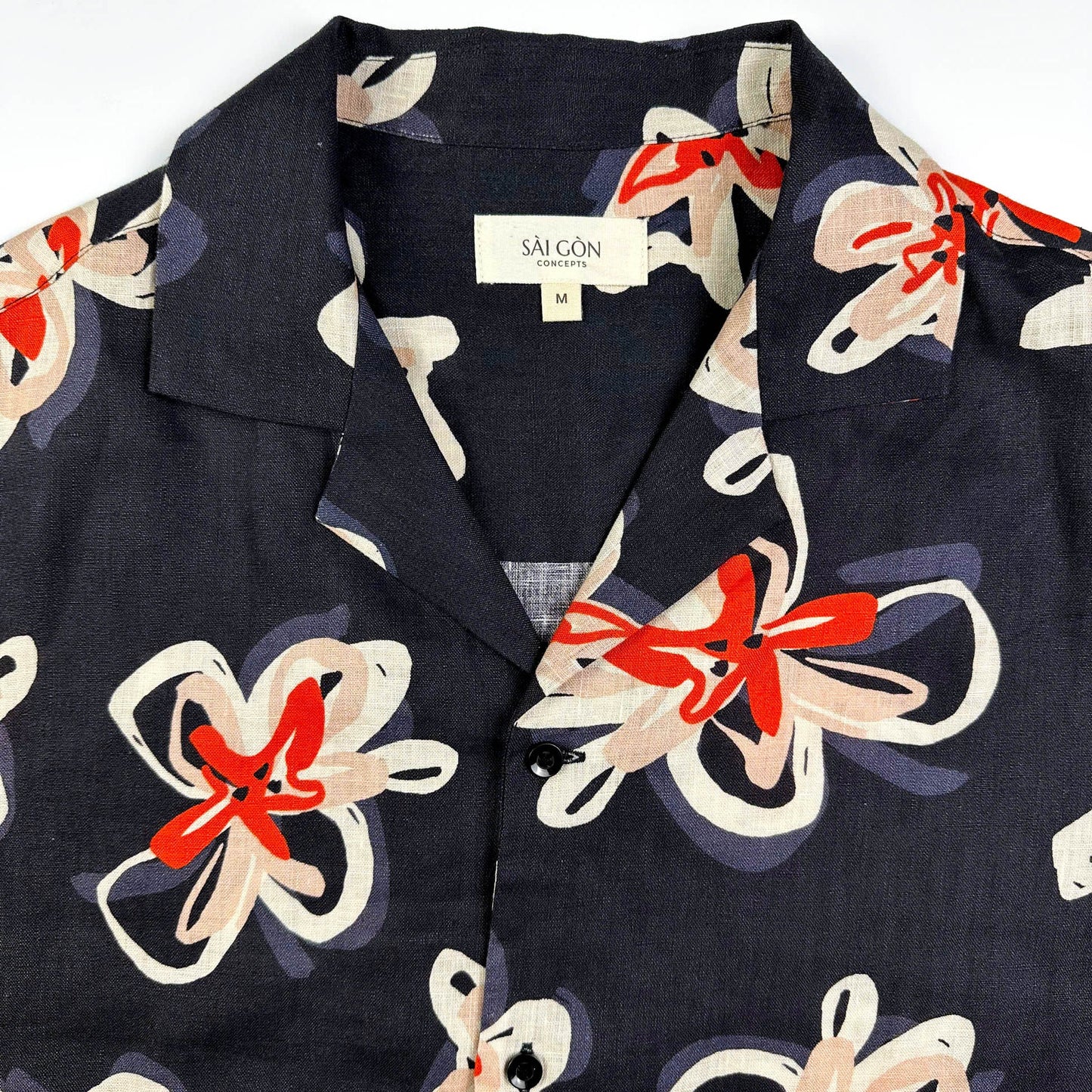 Saigon Concepts Pacific Nights Hawaiian shirt in 100% linen with abstract floral print in navy, beige, and orange-red - sustainable resort wear made in Vietnam