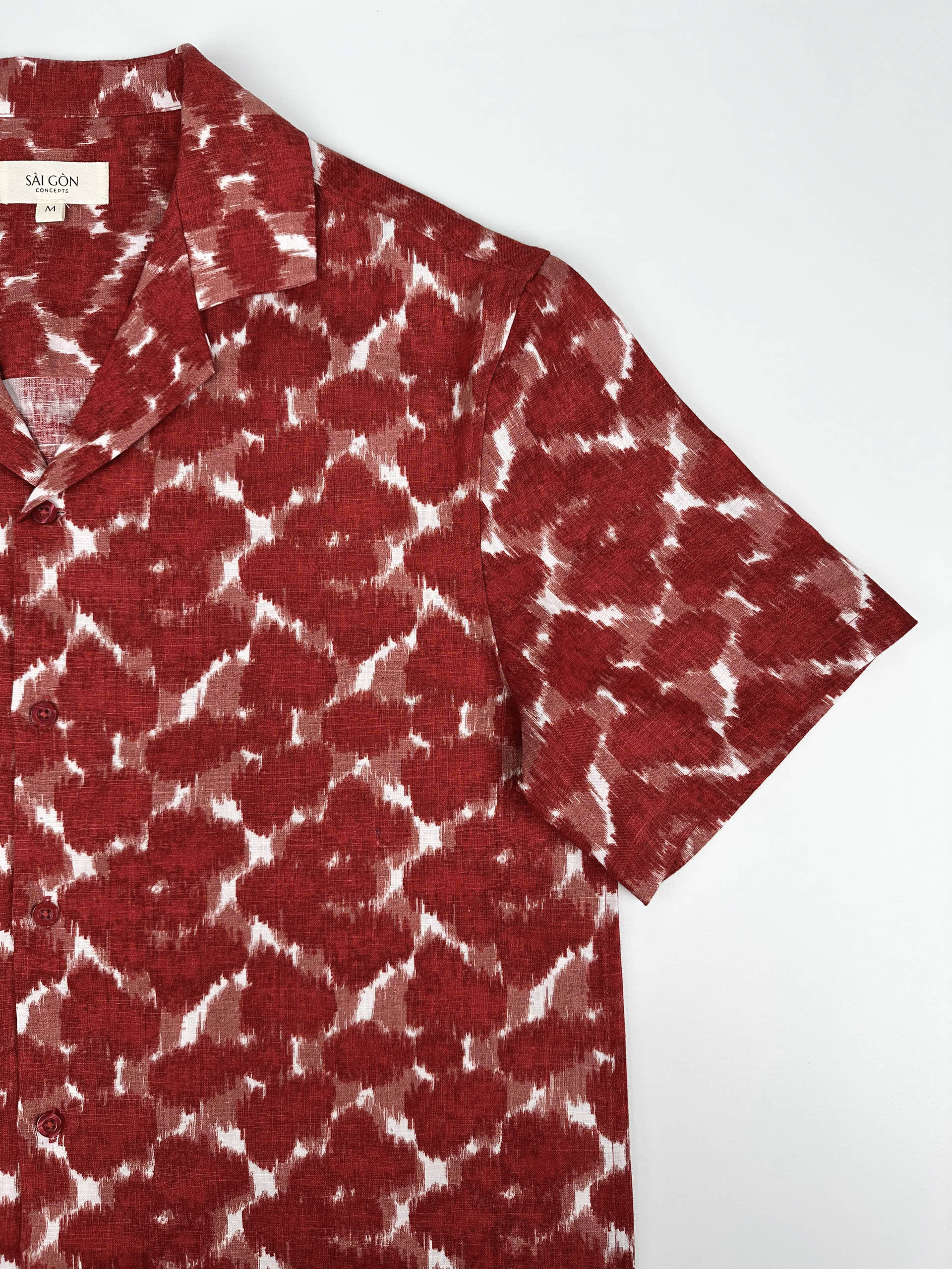 Saigon Concepts Hawaiian Shirt with Red ink blot patterned shirt on a white background - sleeve detail
