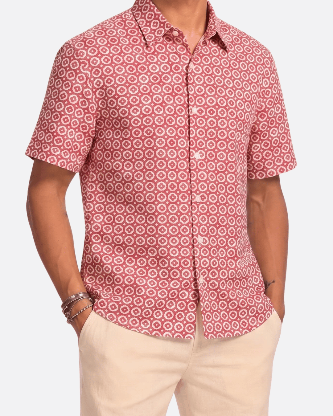 Model wearing Saigon Tiles short sleeve button-up shirt lay flat front collar detail view, terracotta and white geometric tile print