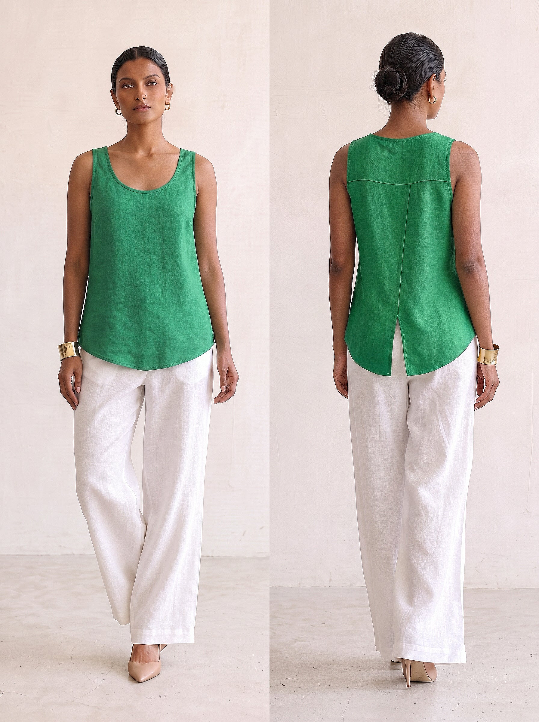 Woman wearing Saigon Concepts Aria linen tank tank top in emerald green colour showing front and back view with overlap flap back detail to keep you cool.