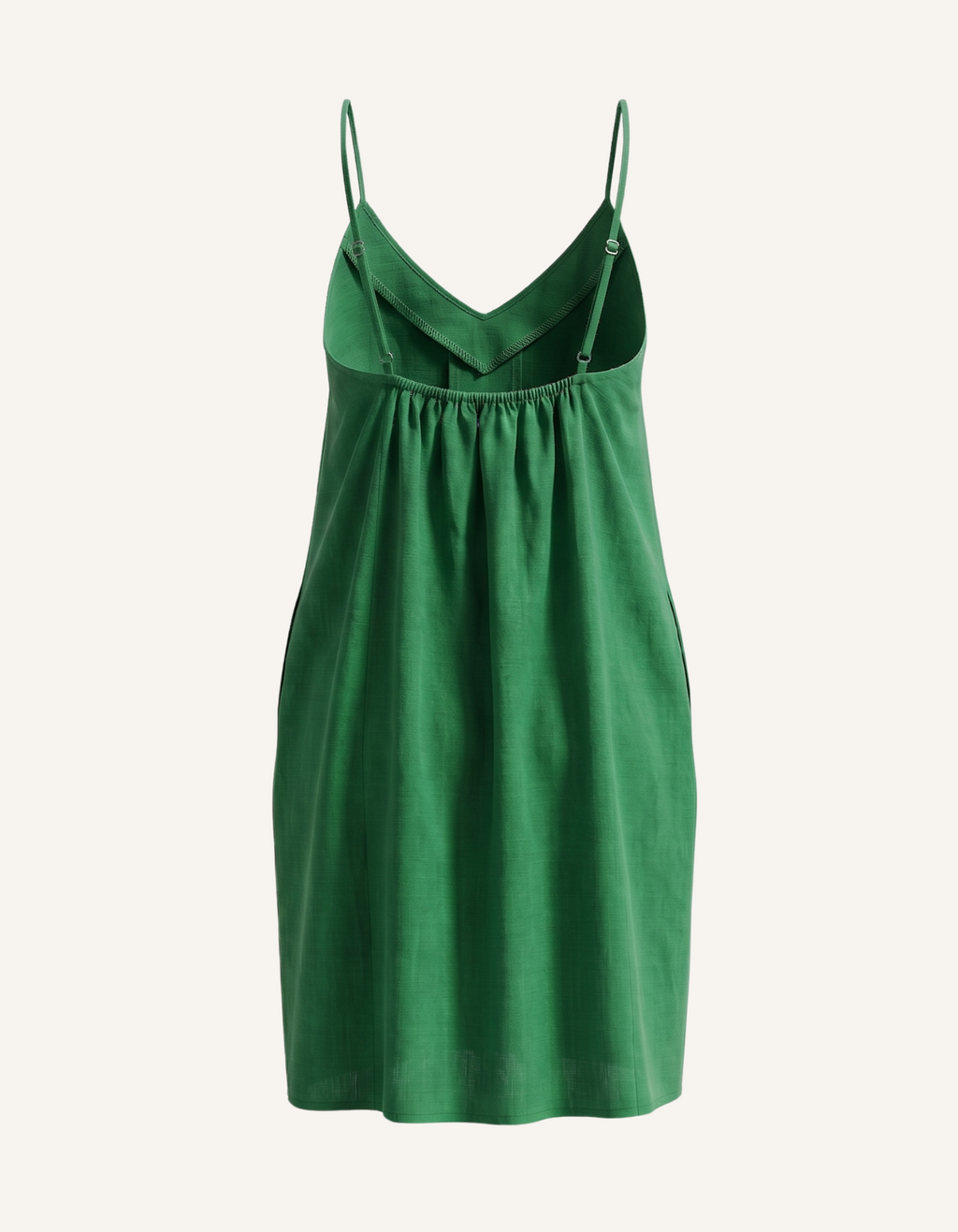 Ghost mannequin front view of a green low-back camisole dress with a fuller skirt