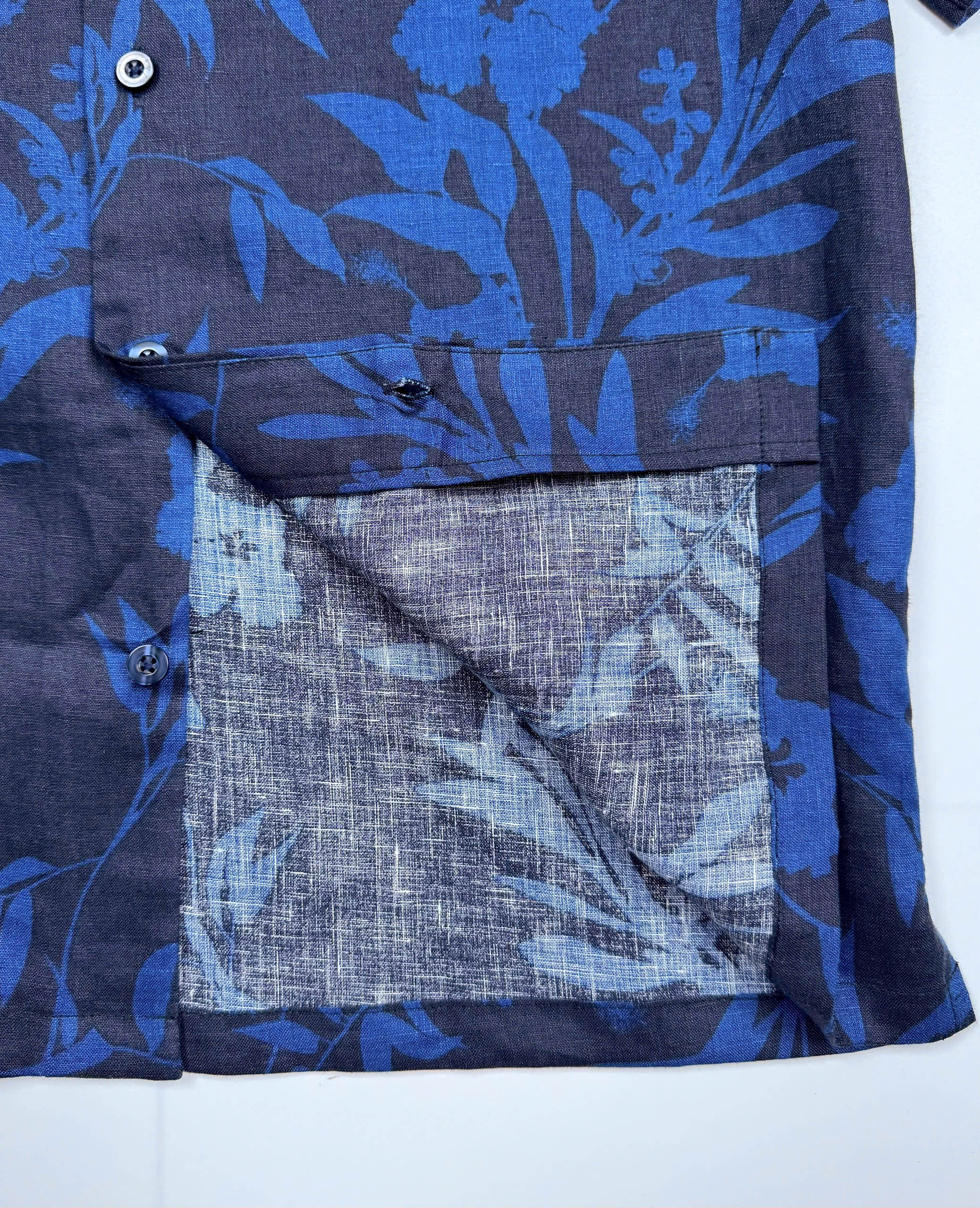 Saigon Concepts Hawaiian Shirt with blue leaf patterned print on a dark navy linen - Seam Detail