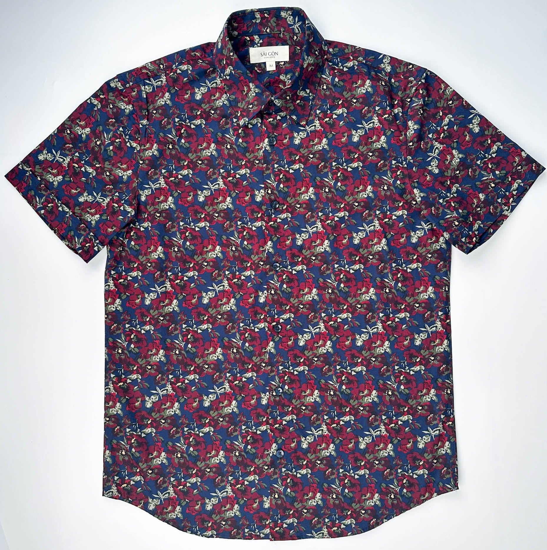 Wild Burgundy cotton short sleeve button-up shirt lay flat front view, burgundy floral print on navy blue.