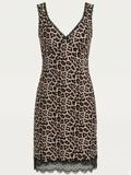 Saigon Concepts Leopard print dress with lace trim on a white background